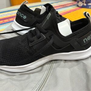 New Balance Black and White Athletic Shoes